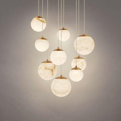 Pisces 9-Light LED Pendant in Aged Brass